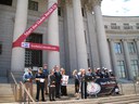 This image is of Pam Hutton at the capitol steps at a podium for the 2010 Click It or Ticket Campaign thumbnail image