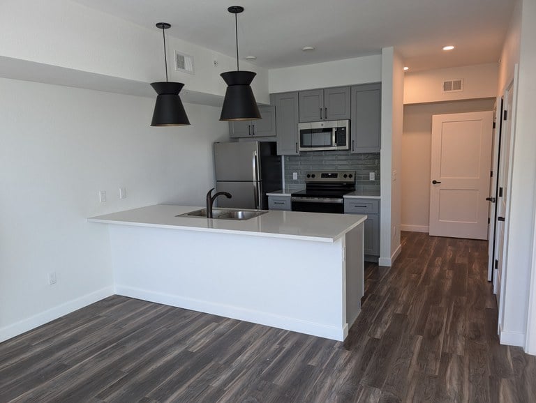 Kitchen in one-bedroom unit at Frisco