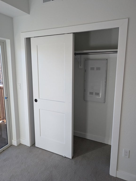 Closet in one-bedroom unit at Frisco