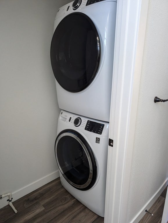 Washer and dryer in utility closet in studio unit at Frisco