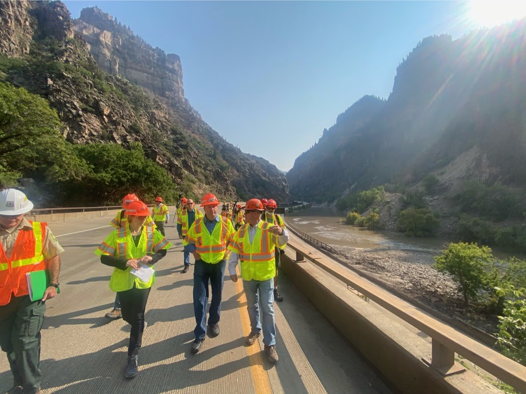 CDOT Executive Director and visitors walking through Glenwood Canyon detail image