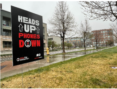 Heads up Phones Down sign