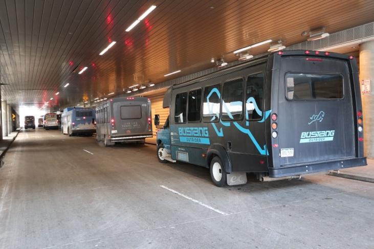 Outrider bus at Gate 1 at the DIA Transit Center