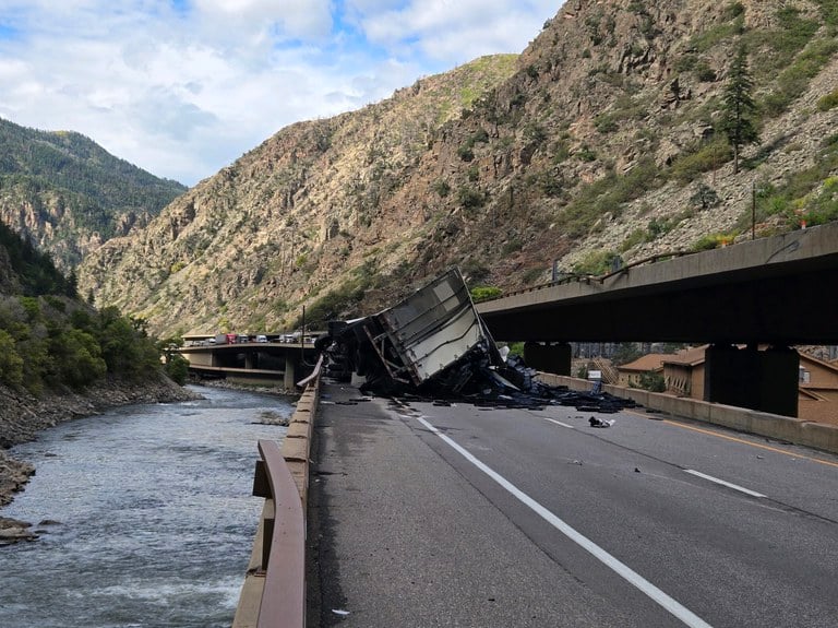 A commercial semi-truck crashed on I-70 about six miles east of Glenwood Springs