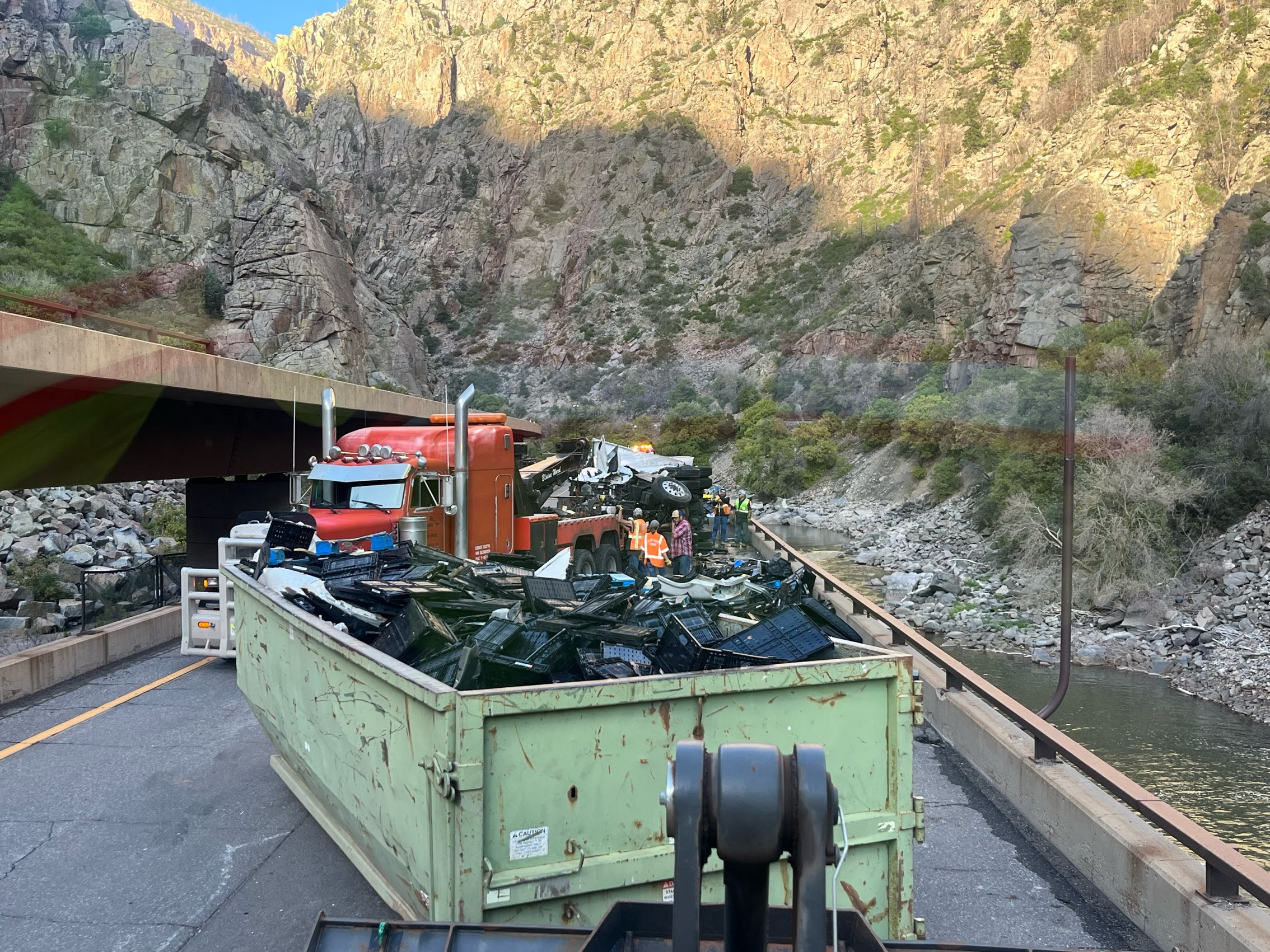 dumpster_hauled_away_semi-truck_crash_debris_glenwood_springs.jpg detail image