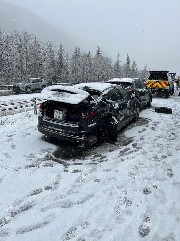 Rear view of a two-car collision during snowy condition. Crash image captured from Monday, Feb. 16, I-70 westbound closure near Empire Junction/ Exit 232 and Georgetown/ Exit 228.