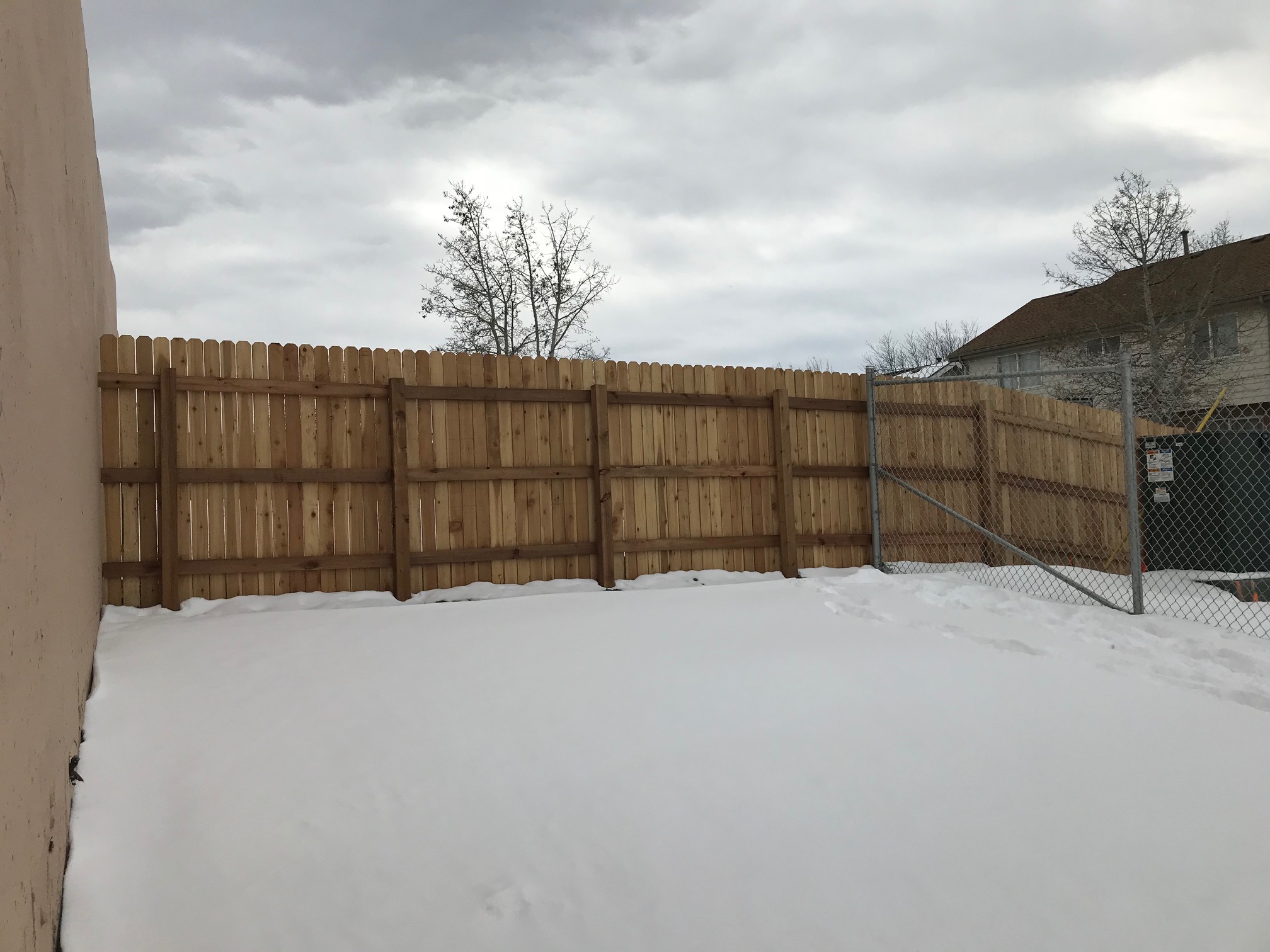 New Backyard Fence for Acoma Street Residents