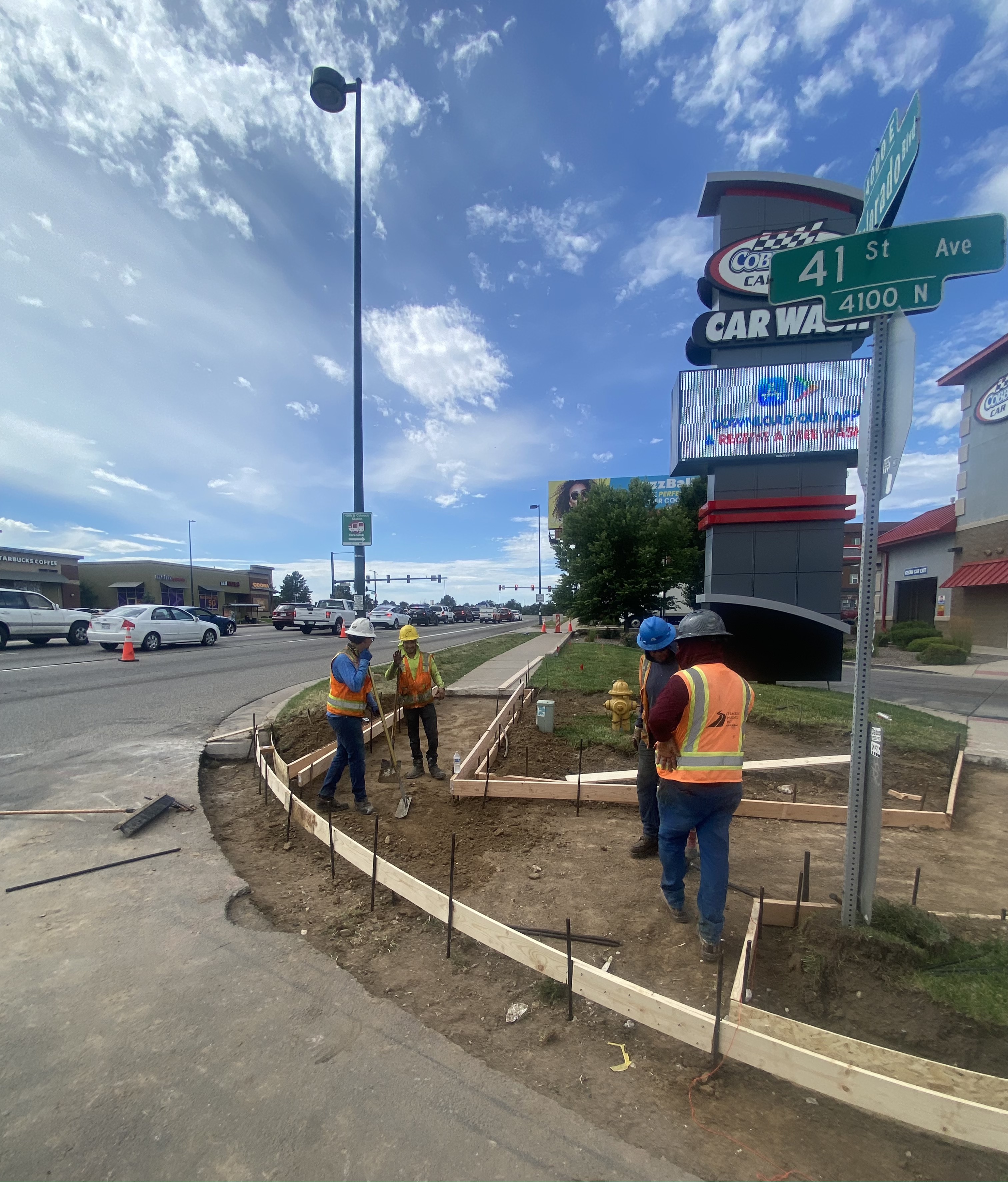 Crews upgrading curb ramps at 41st Avenue and Colorado Boulevard. detail image