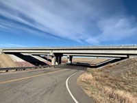 Wide view of finished northbound bridge at I-25 Exit 59 over CR 103.