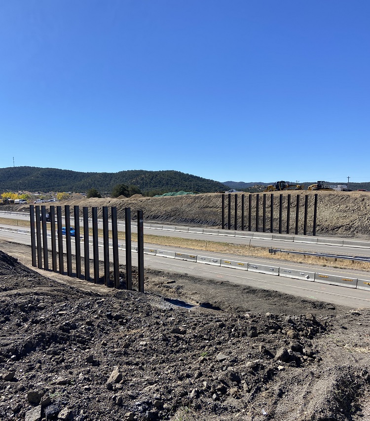 H piles in place on west and east sides of I-25 at Exit 11.JPG detail image