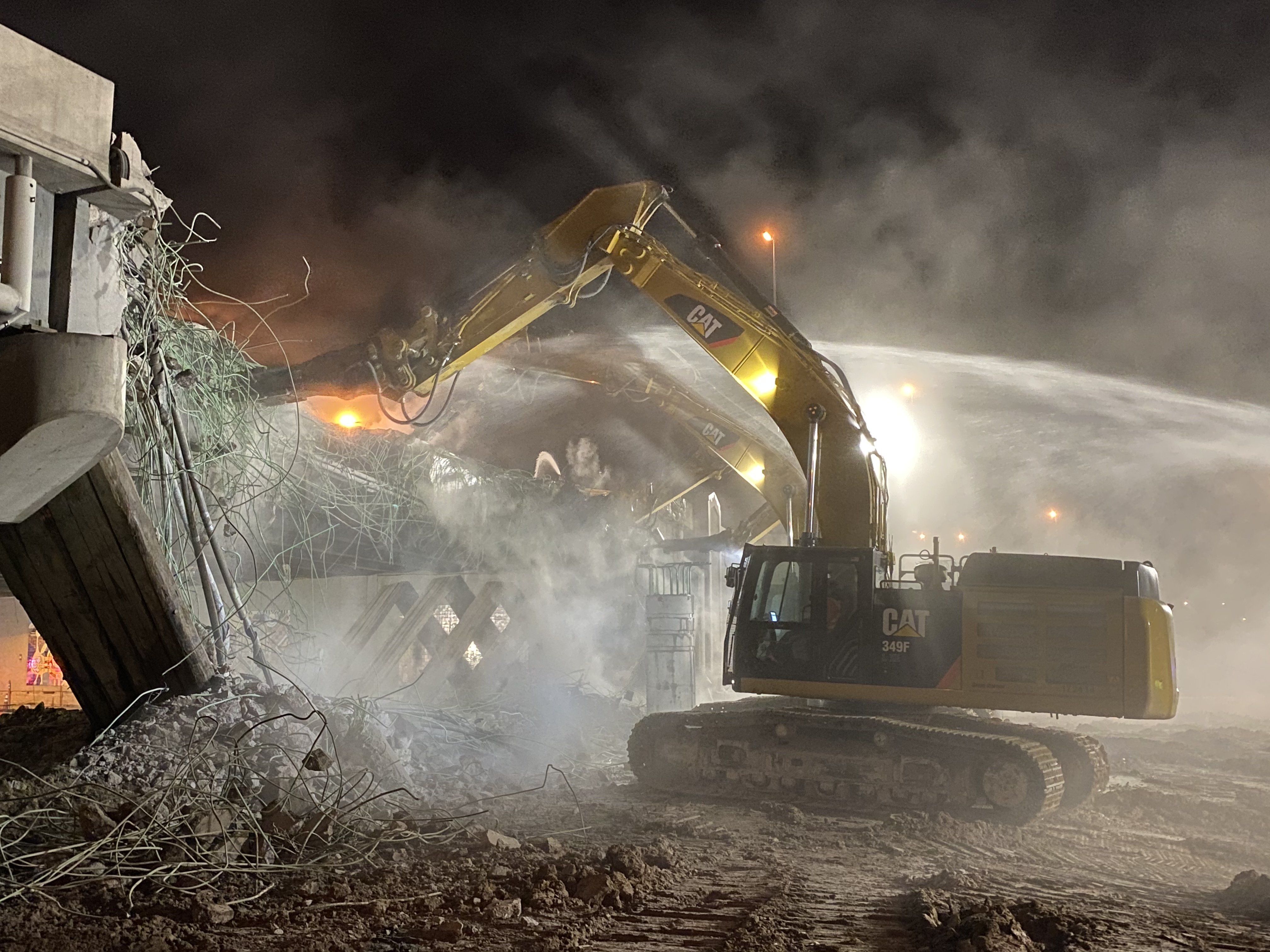 Demolition - excavation equipment with dust detail image