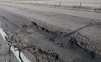 CO 52 wide shot damaged asphalt.jpg detail image