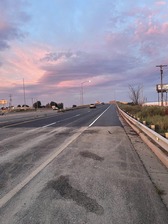 Sunrise over a newly resurfaced section of Colorado Boulevard in August 2023