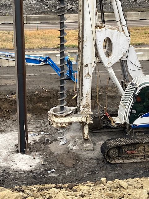 closeup crews pre drilling abutment piles.jpg detail image