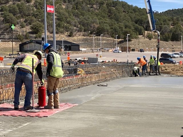 Crews stamping sidewalk on new bridge Photo Steve Spera.jpg detail image