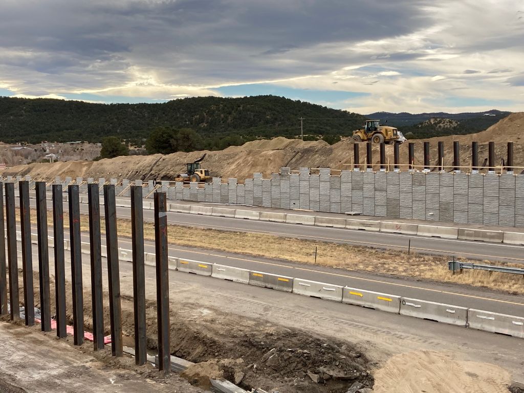southwest view new retaining wall under construction with piles in place.jpg detail image