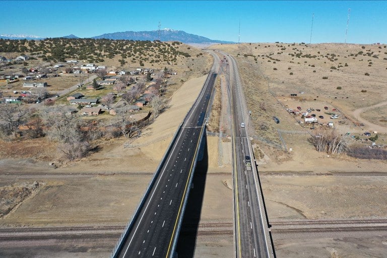 Interstate 25 just south of Colorado Highway 10 highlighting the new bridge and pavement on I-25.