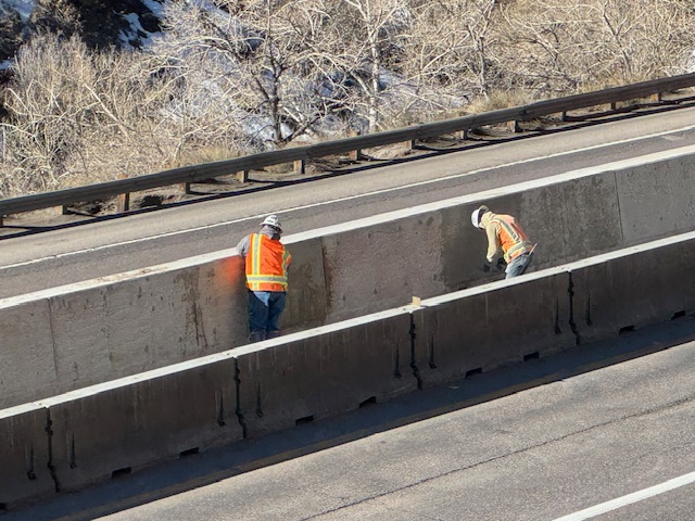 I-70 Resurfacing Chief Hosa to Colfax Crews Stripping and patching poured barrier.jpg detail image