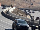 I-70 Resurfacing Chief Hosa to Colfax East view of crews patching barrier at Mile Point 257.jpg thumbnail image