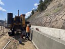 Crews Installing Slip Barrier