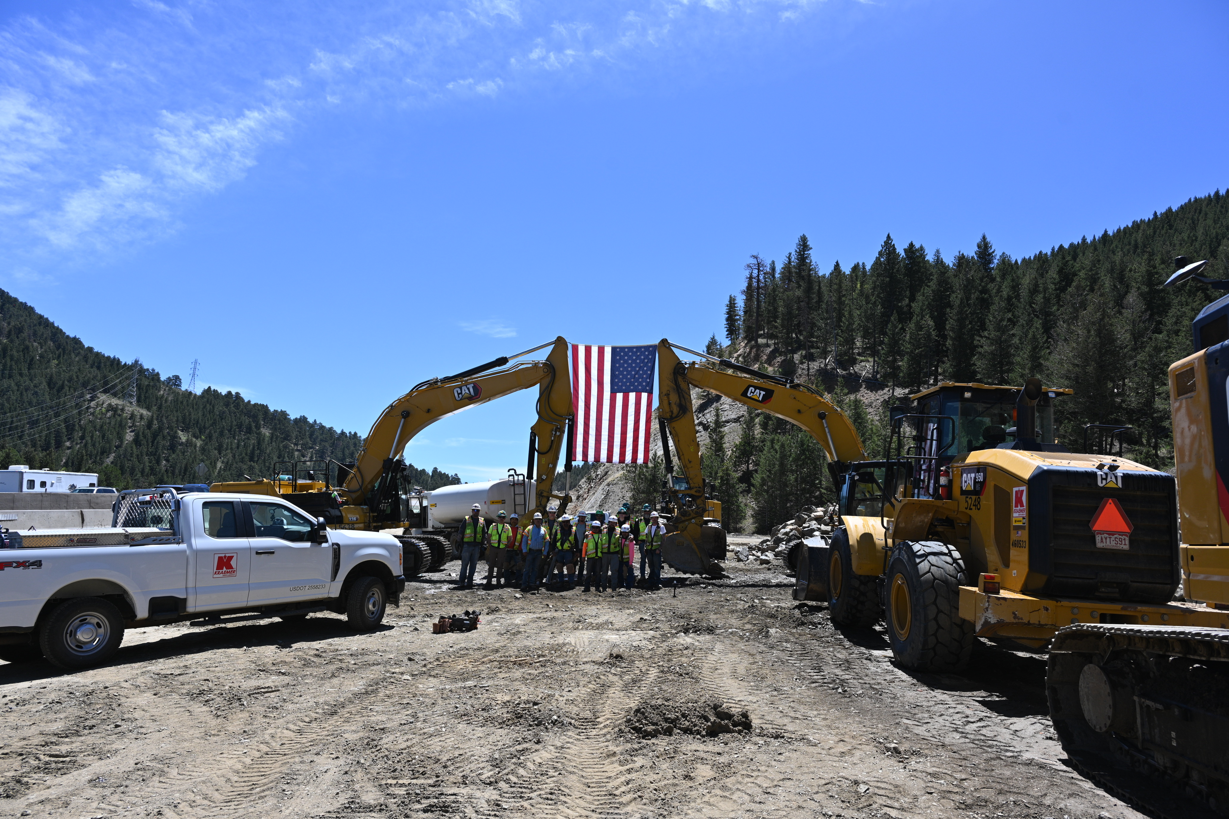 I-70 Floyd Hill Crews in Front of American Flag.JPG detail image