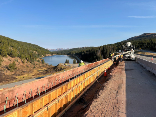 Crews build a new retaining wall near the Vail Pass summit.