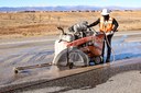 Construction Worker Cutting Asphalt thumbnail image