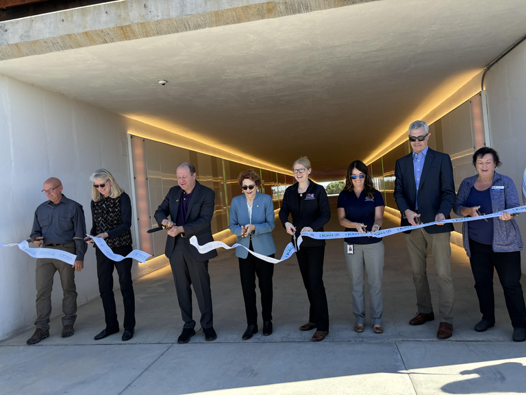 Governor Jared Polis US Department of Transportation Deputy Secretary Polly Trottenberg, CDOT Executive Director Shoshana Lew and local partners cut ribbon at Mobility Hub