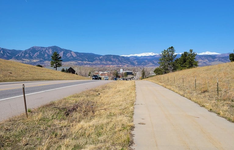 Image taken from sidewalk adjacent to CO 7 east of Westview Drive looking at the mountains. In Boulder County, Colorado. 