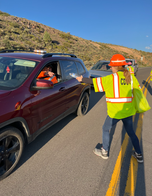 CDOT Executive Director Shoshana Lew and other team members handed out water and cookies to the first motorists waiting to cross the Middle Bridge on Wednesday morning