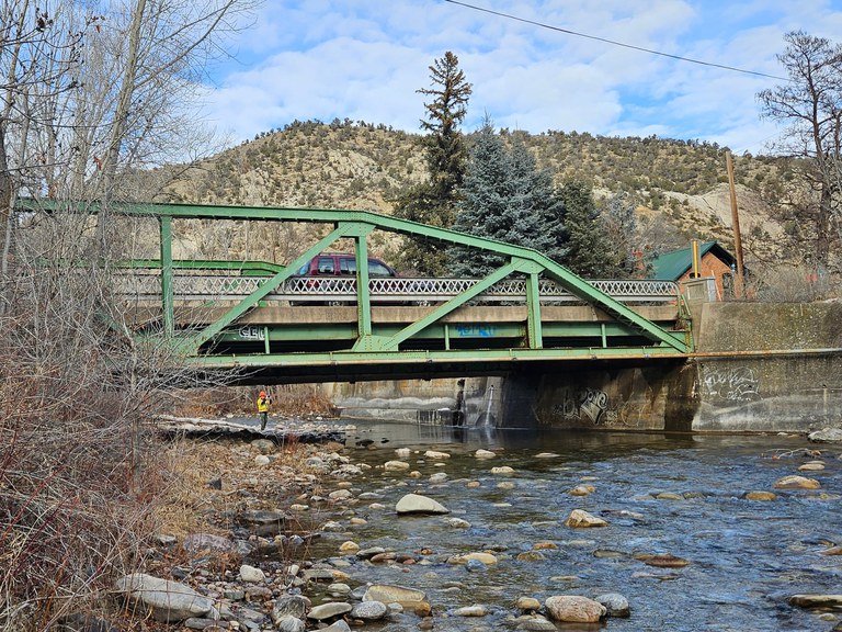 The eastern side of existing deficient structure F-06-A over Elk Creek in January 2024