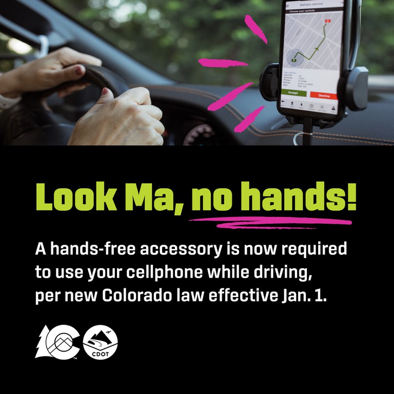 Person driving with their hands on the wheel and their cellphone on a car mount. Text overlay reads "Look ma, no hands!"