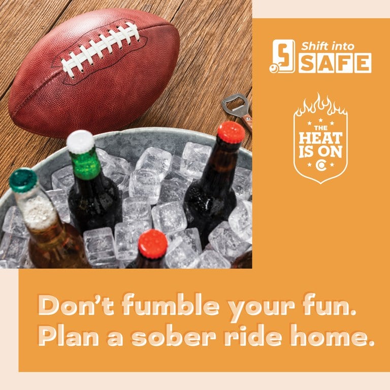 Orange graphic with Shift into Safe logo, The Heat Is On logo and photo of a football next to a bucket of ice with glass beer bottles. On graphic copy reads "Don't fumble your fun. Plan a sober ride home."