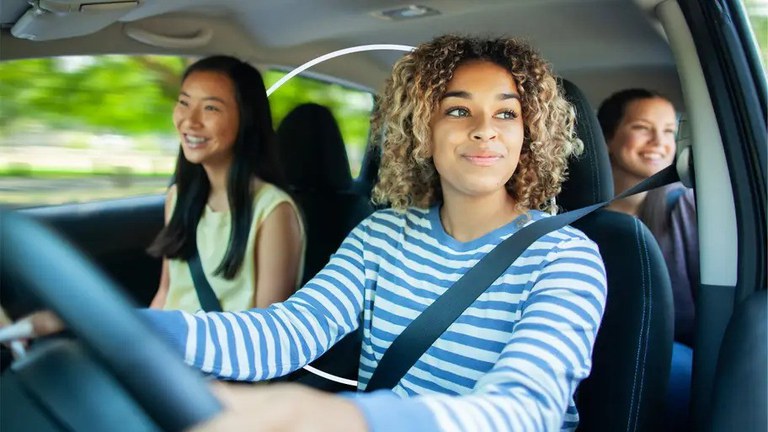 One teenage driver and two teenage passengers riding in a vehicle.