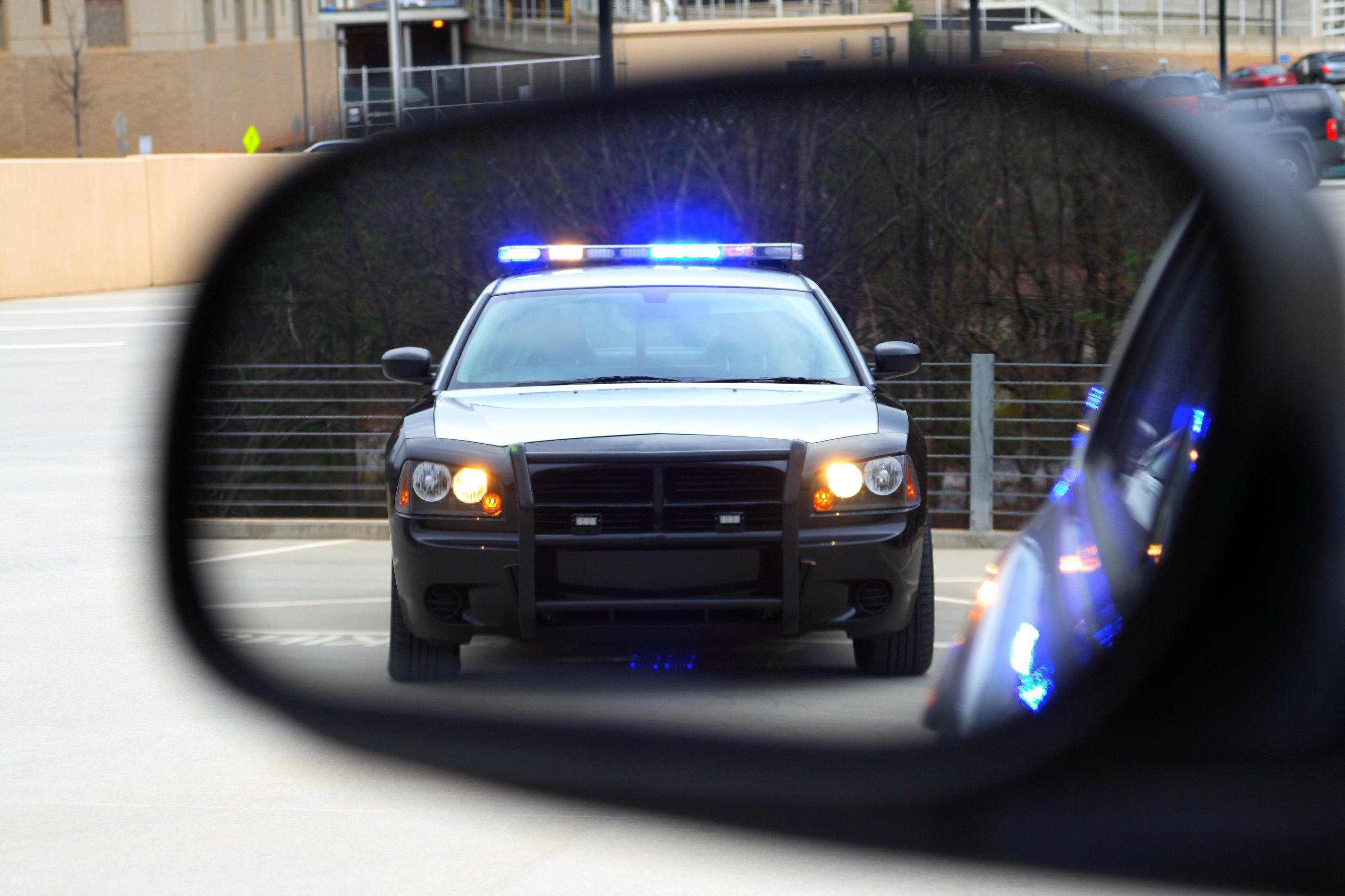 cop-in-rearview-mirror-jpg